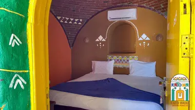 a bed in a lego play house at Kato Waidi Nubian Resort in Aswan