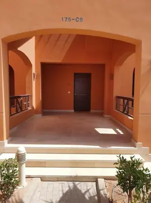 an empty building with stairs and a door at Brand New Waterfront Sabina Ground Floor Home in Hurghada
