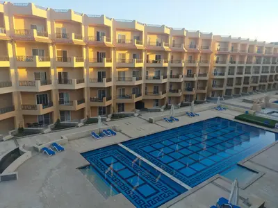 an aerial view of a hotel with a swimming pool at Red Sea Panorama in Hurghada