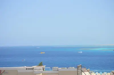 a view of the ocean from the top of a building at Askyhomes in Hurghada