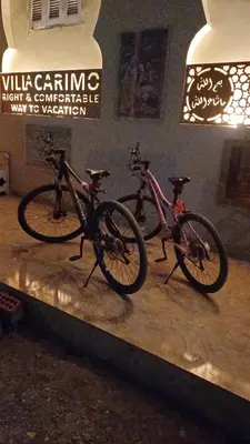 two bikes parked on a table in a room at Sunny sea in Quseir