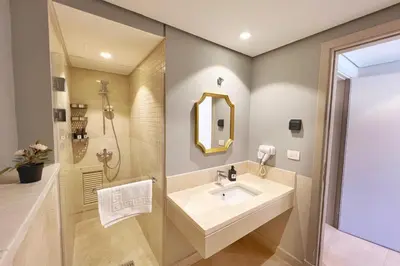 a bathroom with a sink and a shower at Modern & Mellow 1 BDR Mangroovy Free Beach & Pool Access in Hurghada