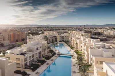 an aerial view of a city with buildings at Modern & Mellow 1 BDR Mangroovy Free Beach & Pool Access in Hurghada