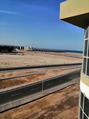 a view of the beach from the window of a building at 403 A in Hurghada