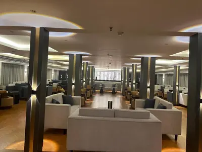 a lobby with couches and chairs in a building at Nile Cruise 5 Stars From Luxor And Aswan 3&4 Nights in Aḑ Ḑab‘īyah
