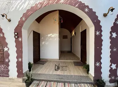 an entrance to a building with an arch with snow motives at Torya Nubian House in Aswan