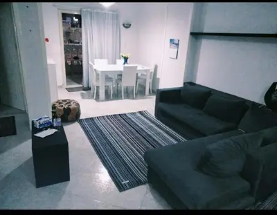 a living room with a couch and a table at Hurghada Red Sea in Hurghada