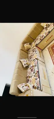 a group of pillows sitting on top of a couch at Hadi Guest House in Luxor