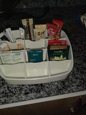 a tray filled with books on top of a table at Florenza khamsin aprt F7 in Hurghada