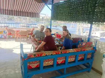 a group of people sitting at a table at Airkela Nuba Dool 2 in Aswan