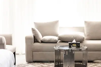 a living room with a couch and a table at El Gouna Elite Worldwide Sea & Garden Residences - Hurghada, Egypt in Hurghada