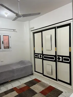 a bedroom with a bed and a ceiling at Villa Set ma'at Nile view in Luxor