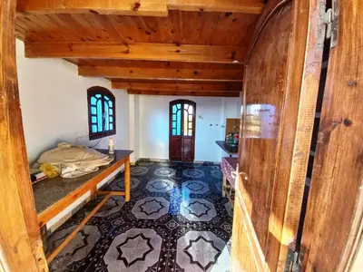 a room in a house with a bed in it at Lucky House in Luxor