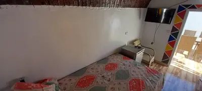 a small bedroom with a bed in a room at Casablanca Guest House in Aswan