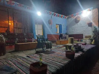 a living room with a couch and a rug at Nubian studio in Aswan