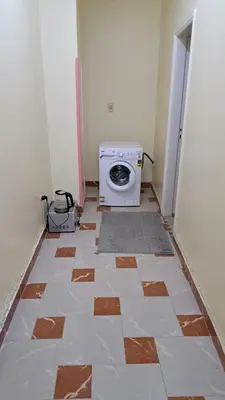a room with ailed floor with a stove in it at Sweet Home-ممنوع للمصرين Open 24 Hour in Hurghada