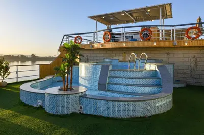 a swimming pool on a cruise ship at Nile Treasure Cruise - 4 or 7 Nights From Luxor each Saturday and 3 or 7 Nights From Aswan each Wednesday in Luxor