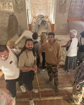 a group of people standing in a room in a building at sun smile guest house᭄ꦿ in Luxor