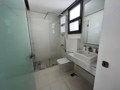 a bathroom with a toilet and a sink and a shower at 3bedroom apartment with a private pool in Hurghada