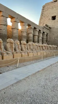 a long row of seats in a building at Luxor Nile palace in Luxor