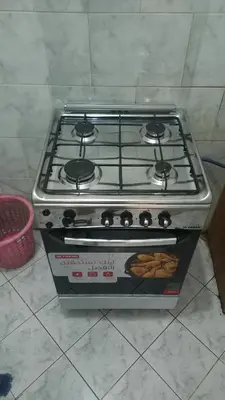 a stove top oven sitting on a kitchen floor at New ikea flat 2 in Hurghada