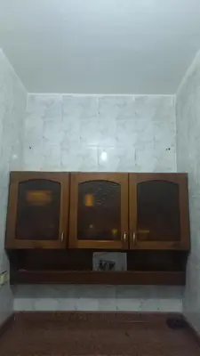a kitchen counter with three windows in a wall at New ikea flat 2 in Hurghada