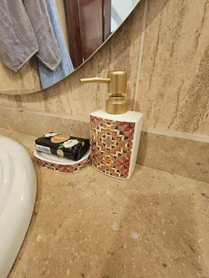 a bathroom with a sink and a faucet at Hurghada - Apartment Blue Lagoon in Hurghada