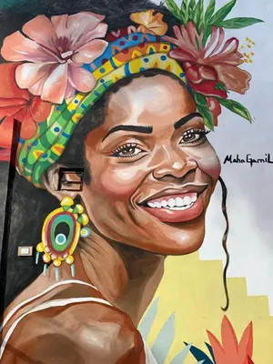 a painting of a woman wearing a colorful hat at White House in Aswan