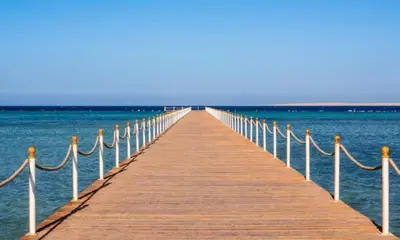 a wooden pier stretches out over the water at Sweet Home in Hurghada