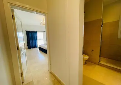 a room with a bathroom with a shower and a toilet at Unique 6 Bedrooms Villa 38 at White Villas El-Gouna in Hurghada