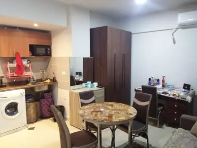 a small kitchen with a table and a small kitchen with a tableablish at Princess resort unit number 260A Markos in Hurghada