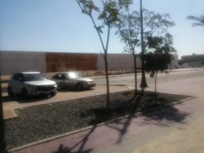 two cars parked on the side of a street at Princess resort unit number 260A Markos in Hurghada