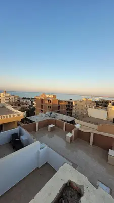 a view of a city from the roof of a building at Ahmed House in Safaga
