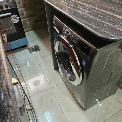 a washing machine with a counter on top of it at Susan's Guest House and Tours in Luxor