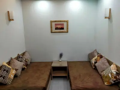 a living room with a couch and a table at شقة احلامك على البحر in Hurghada