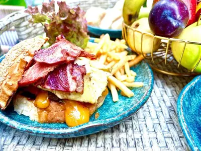 a plate of food with a sandwich and french fries at Hurghada - Apartment - Sleeps 6 - Pool - Parking in Hurghada