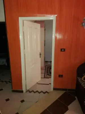 an open door in a room with a room with a floor at الفاوى - القصير in Quseir