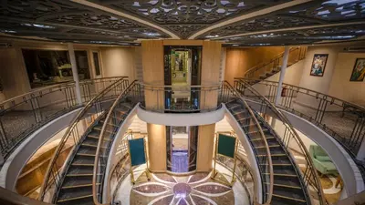 an overhead view of a spiral staircase in a building at Cleopatra Nile Cruise in Luxor
