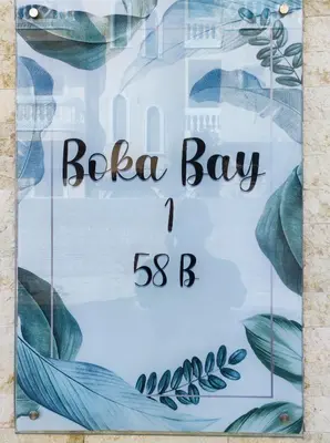 a poster for a bachelorette party with blue leaves at Boka Bay One in Hurghada