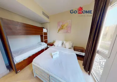 a hotel room with two beds and a window at Beautiful 2B. Rooms M7-4B Mangaroveey in Hurghada