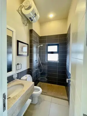 a bathroom with a toilet and a sink and a shower at tawila T 31 in Hurghada