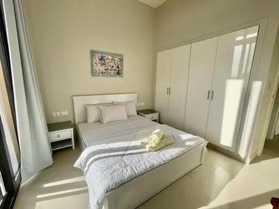 a bedroom with a bed with a stuffed animal on it at tawila T 31 in Hurghada