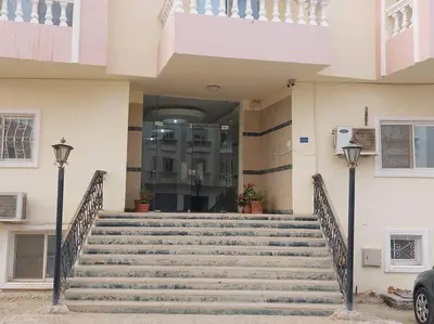 a set of stairs in front of a building at Nice Studio in Elegant Compound Intercontinental Area in Hurghada