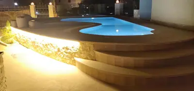 a swimming pool with a led lighting around it at Villa Anna & Snake in Hurghada