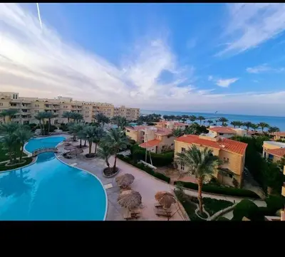 an aerial view of a resort with a swimming pool at Palma Resort in Hurghada